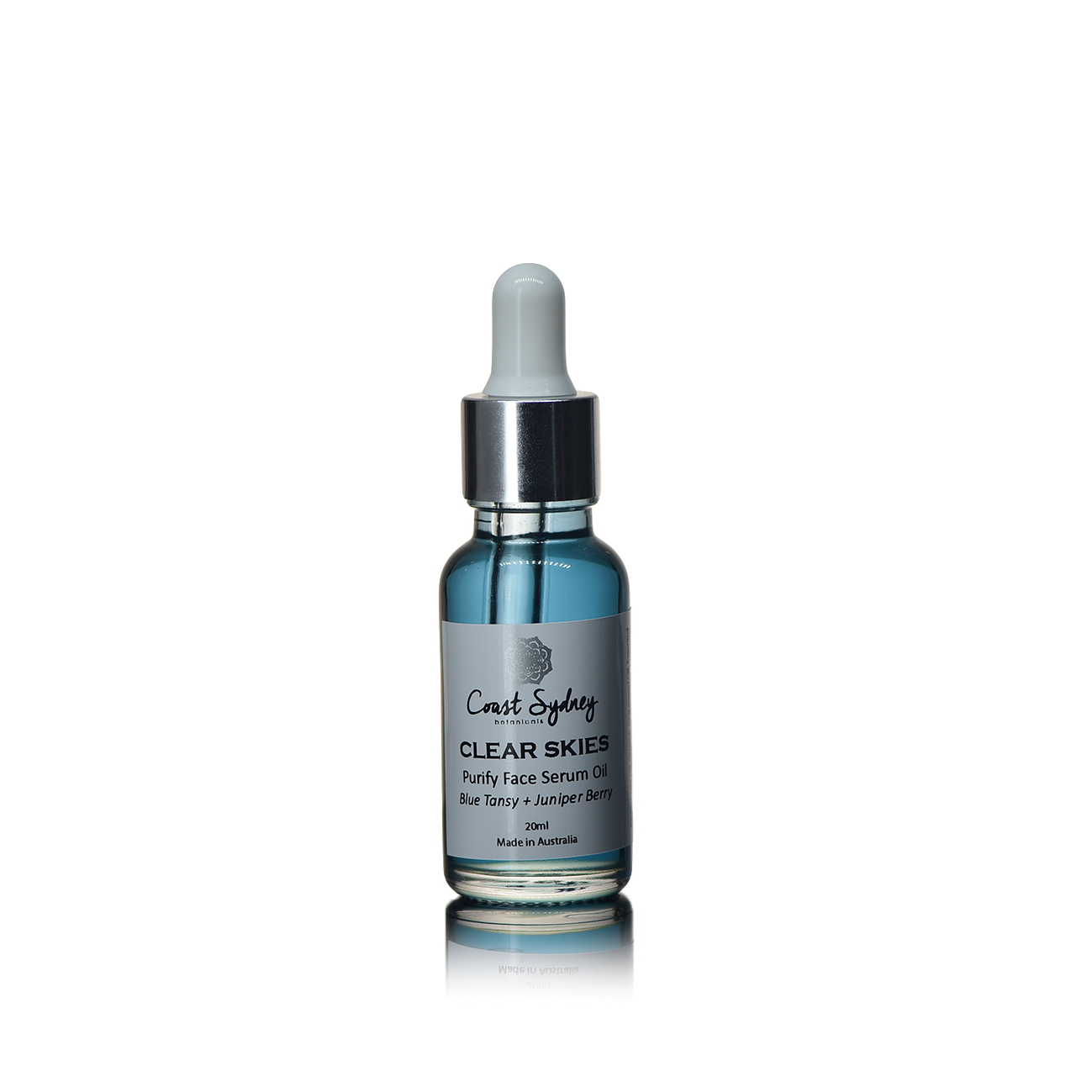 A blue face serum oil in a dropper bottle named 'Clear Skies.' 