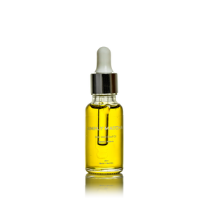 A green/yellow face oil in a dropper bottle named 'Simply Matcha.'