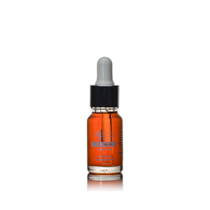 A red/orange face serum in a dropper bottle named 'Renew.'